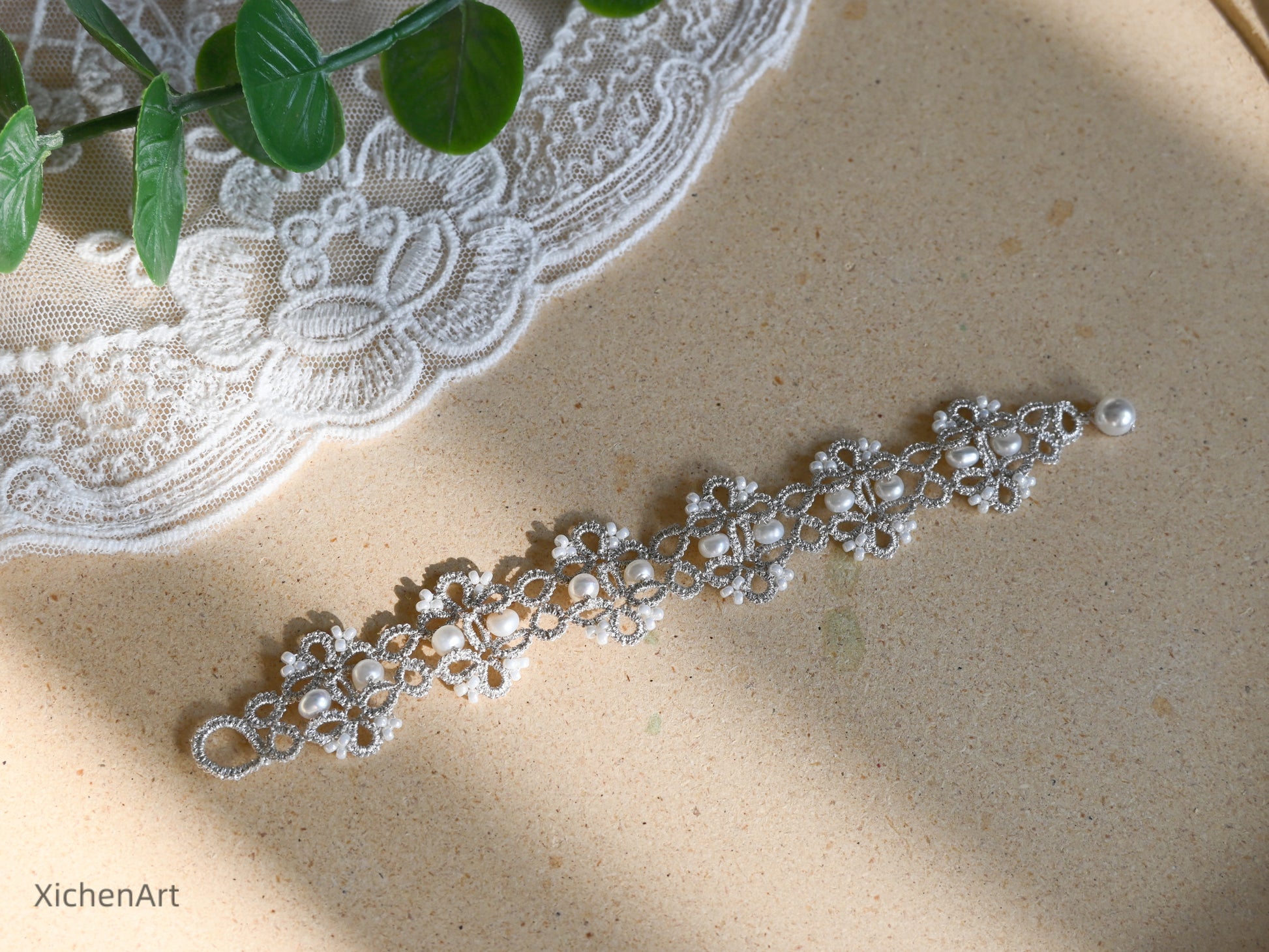 tatting bracelet with silver thread with natural pearls