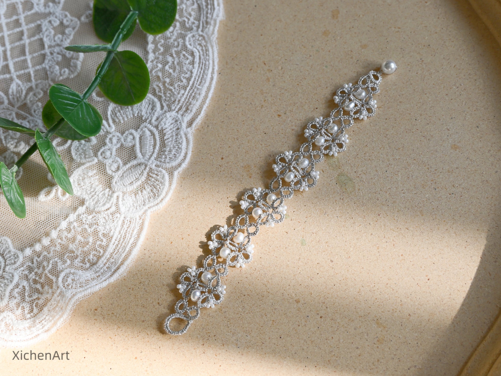 tatting bracelet with silver thread with natural pearls