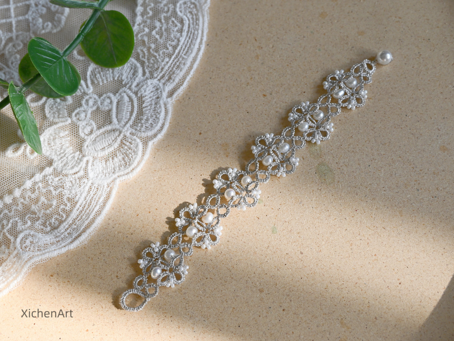 tatting bracelet with silver thread with natural pearls