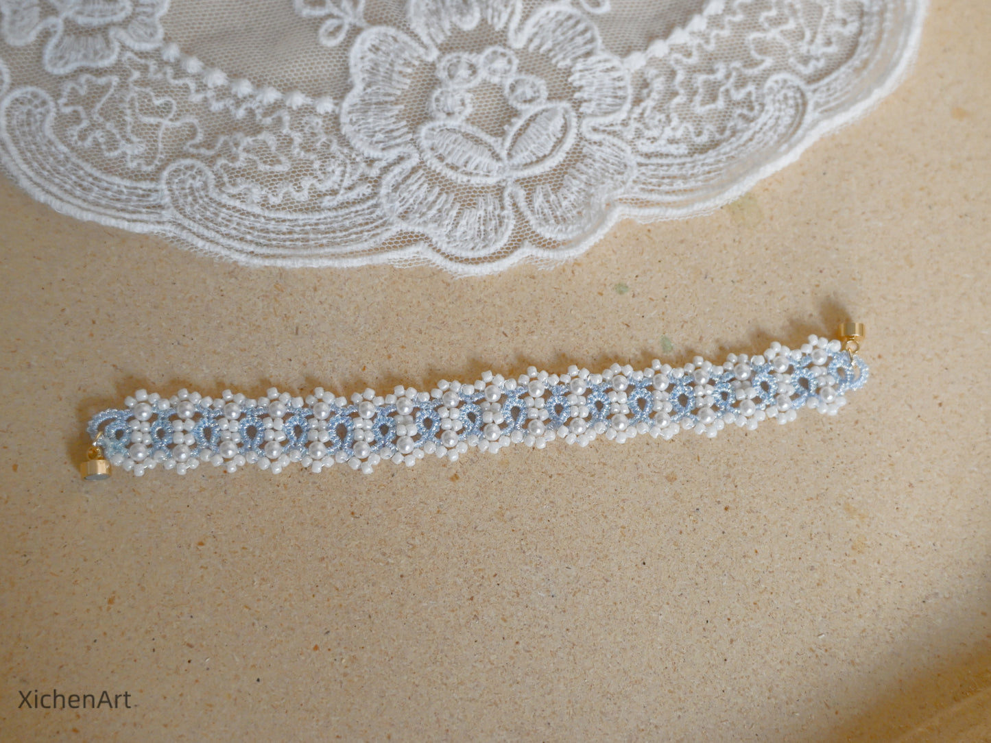 light blue tatting bracelet with pearl and miyuki beads