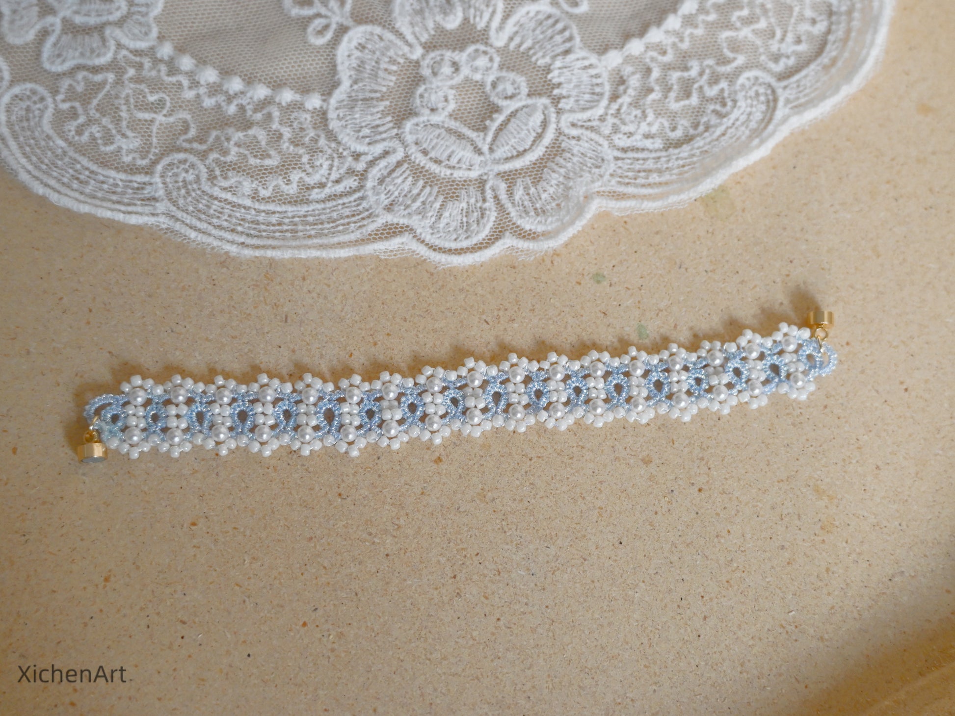 light blue tatting bracelet with pearl and miyuki beads