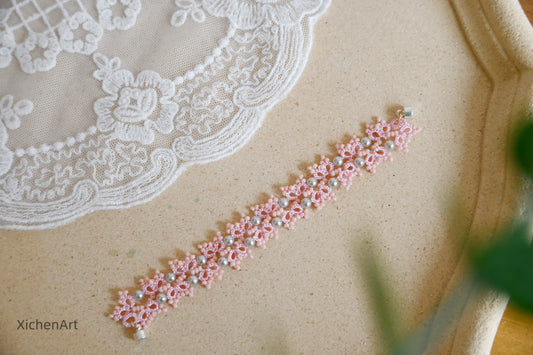 pink tatting bracelet with silver pearl very shine