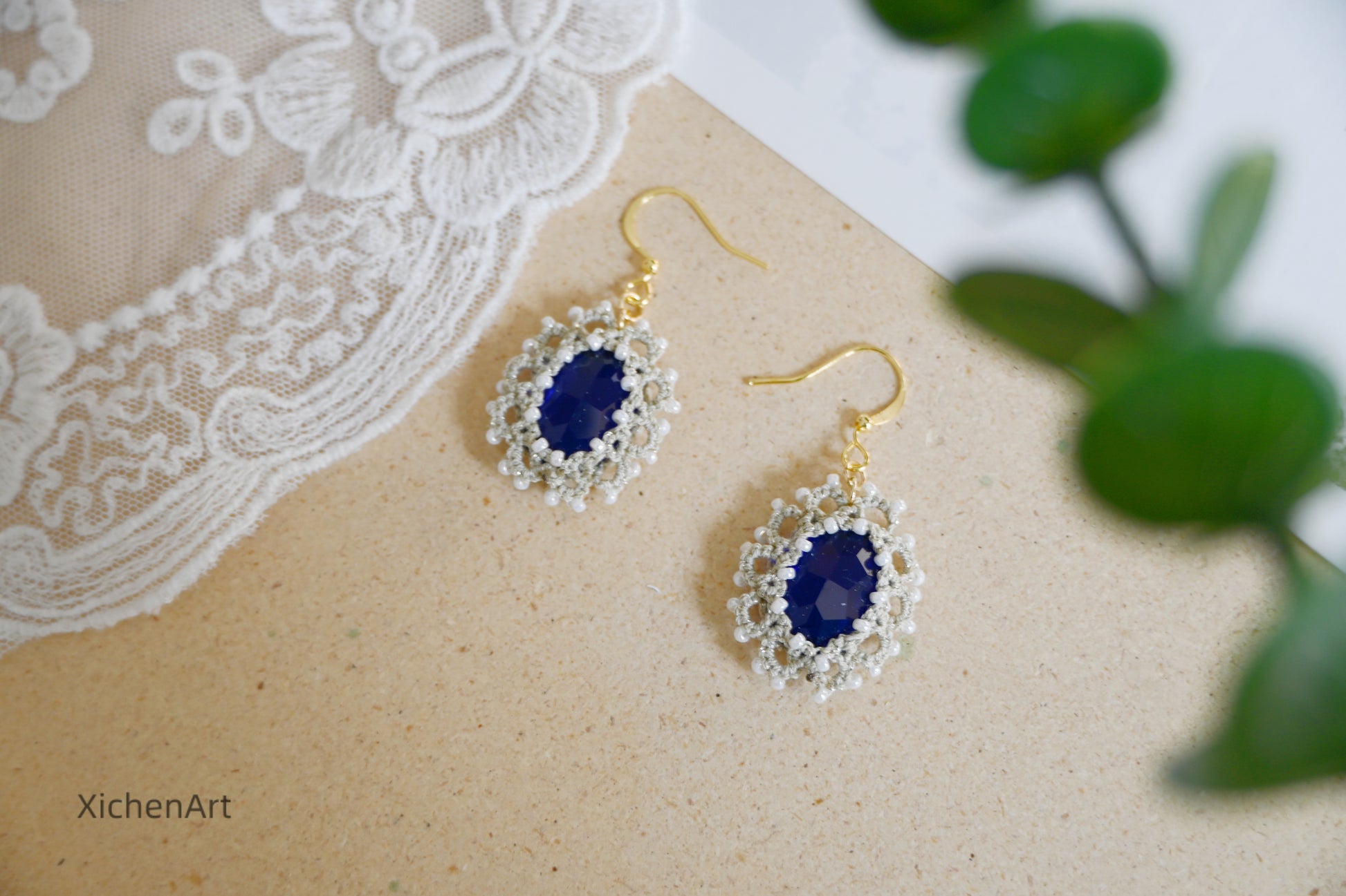 tatting earring with blue crystal