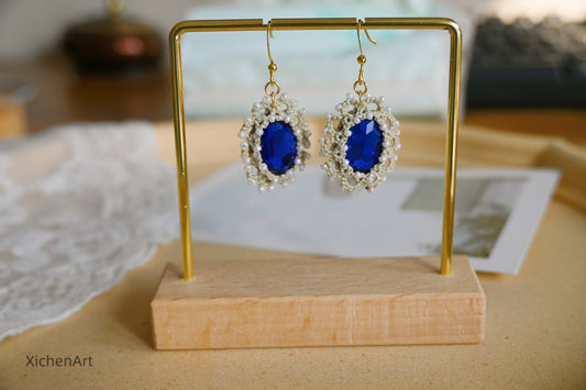 tatting earring with blue crystal