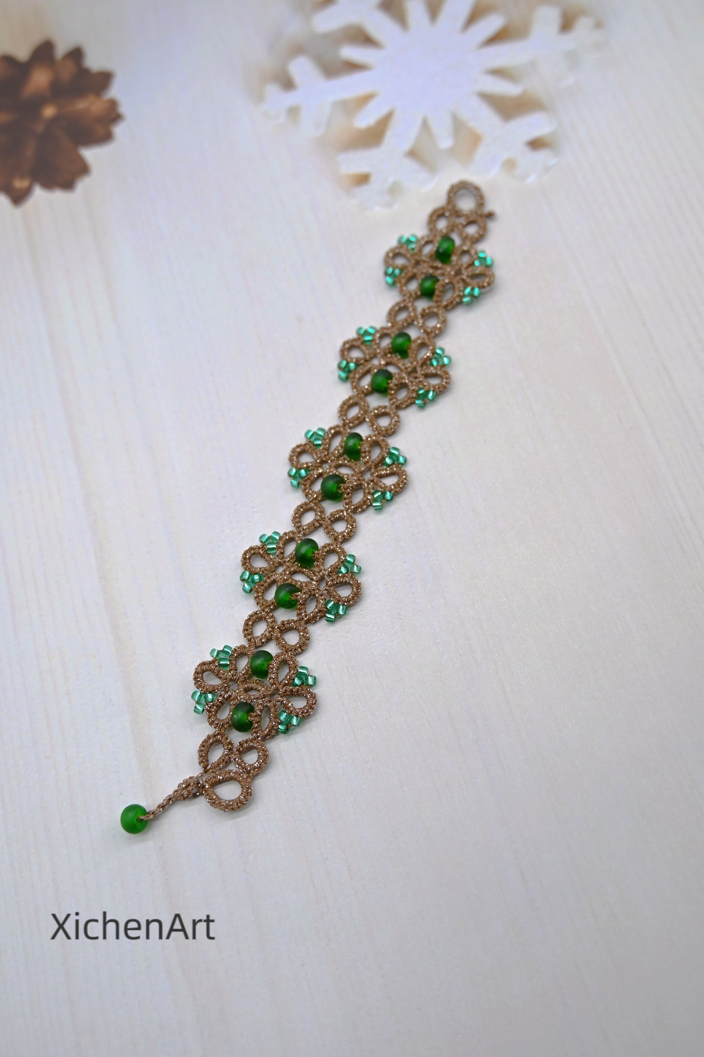 Tatting lace bracelet with metallic thread and glass beads