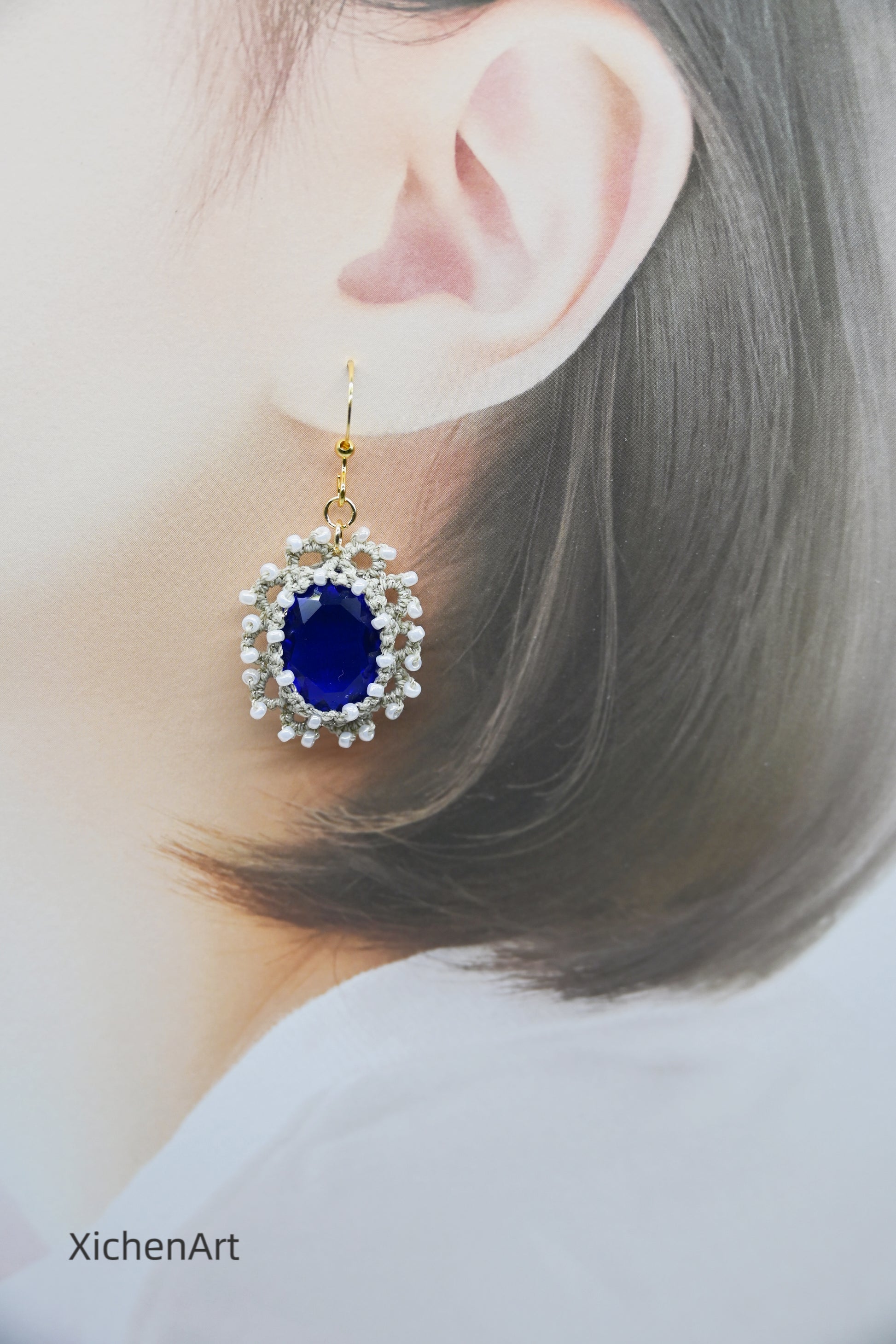 tatting earring with blue crystal