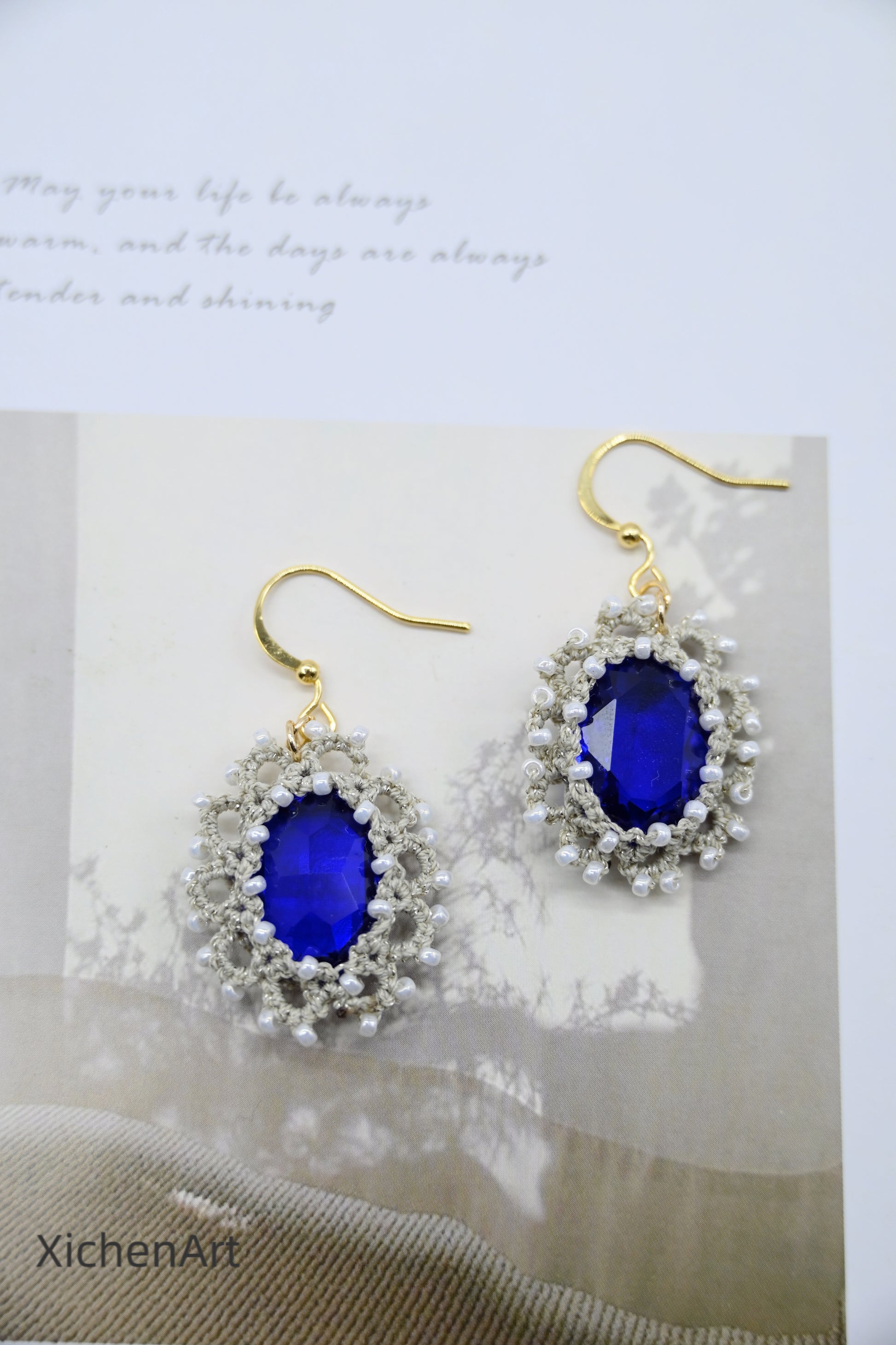 tatting earring with blue crystal